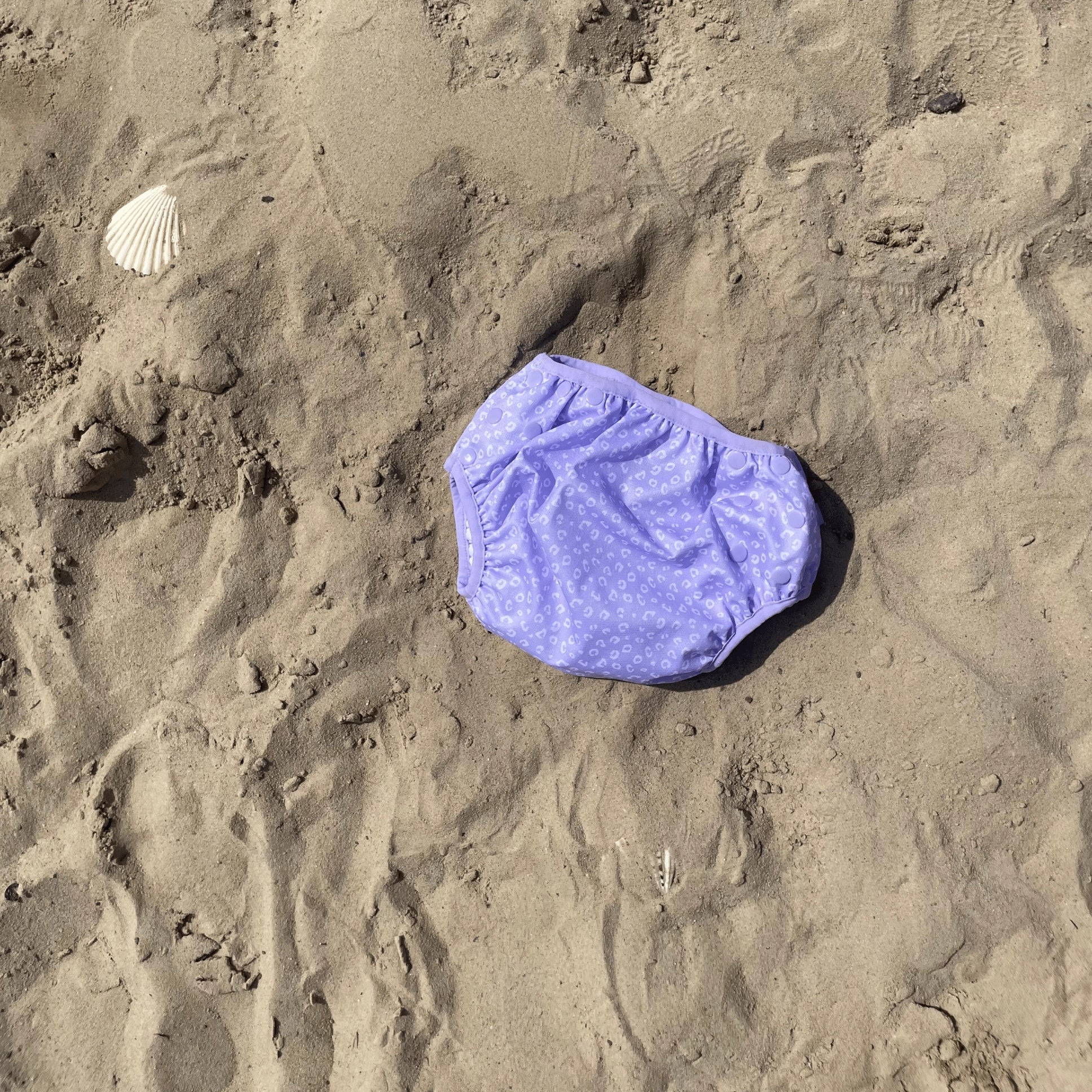 Atkārtoti lietojamās peldbiksītes (Swim Diaper) | Lila Leopard